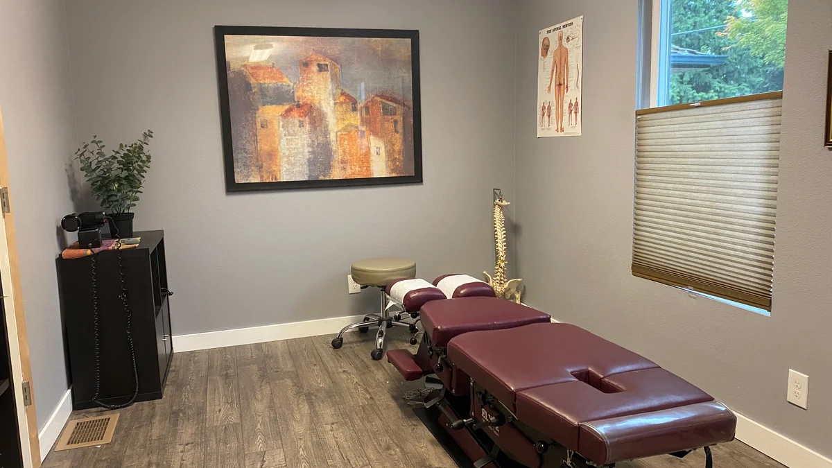 Chiropractic treatment room with adjustment table at Back In Shape Chiropractic in Milwaukie, Oregon